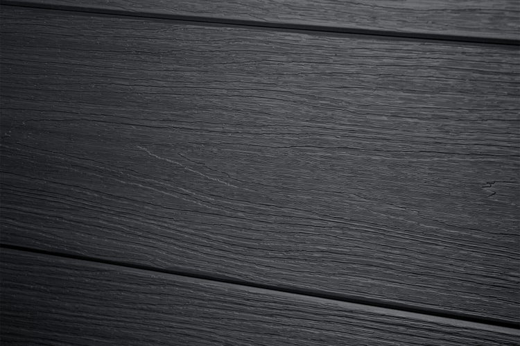 Nahaufnahme einer Terrassendiele mit Holzmaserung in Anthrazit