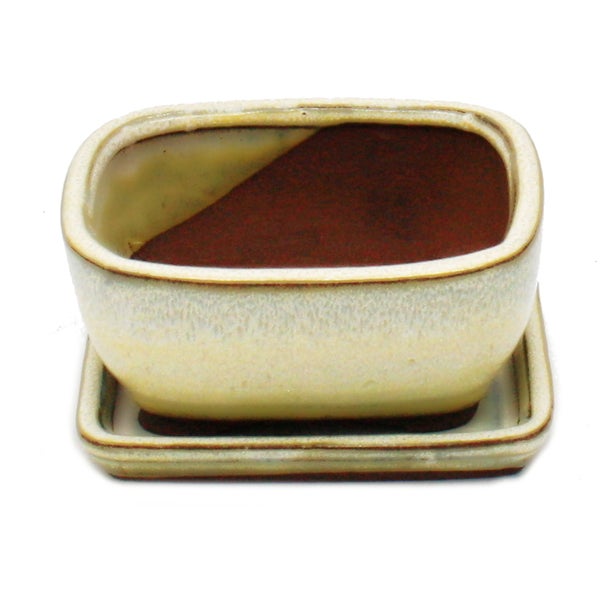 Modernes Badezimmer mit Aufsatzwaschbecken, Armatur und Holzelementen