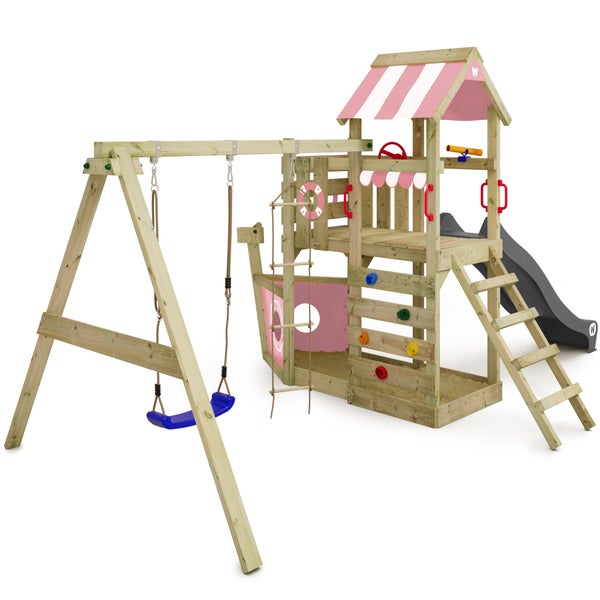 WICKEY Spielturm Klettergerüst SeaFlyer mit Schaukel und Rutsche, Baumhaus mit Sandkasten, Kletterleiter und Spiel-Zubehör – pastellpink