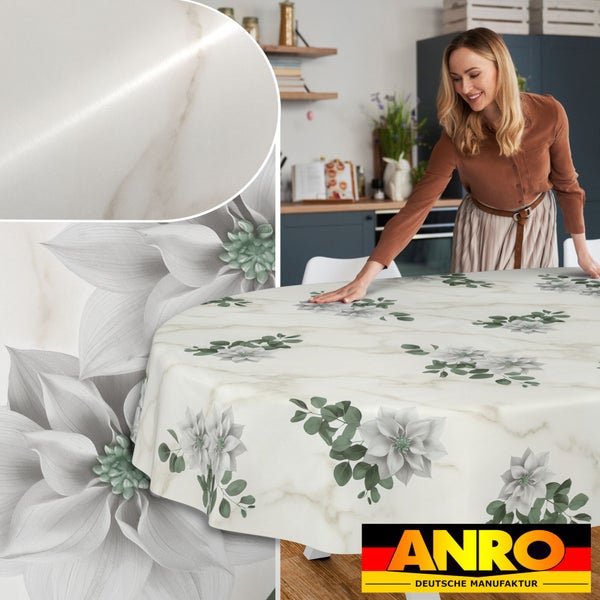 Runde Tischdecke mit Marmor-Dekor und Blumenmuster in einer hellen Küche. Detailansicht der Materialoberfläche. ANRO Deutsche Manufaktur Logo.