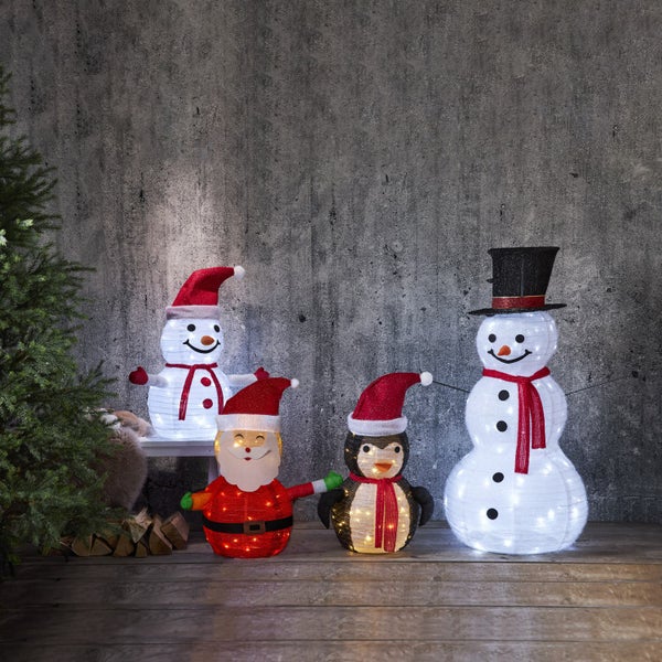Weihnachtsdekoration mit Schneemann, Weihnachtsmann und Pinguin mit Beleuchtung