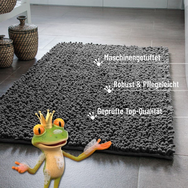Dunkelgraue maschinengetuftete Badematte mit Noppenstruktur auf Fliesenboden, robust und pflegeleicht in geprüfter Qualität.