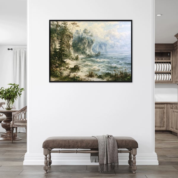 Wandbild mit Küstenlandschaft im schwarzen Rahmen, hängend über einer Sitzbank in einem geschmackvoll eingerichteten Wohnbereich.