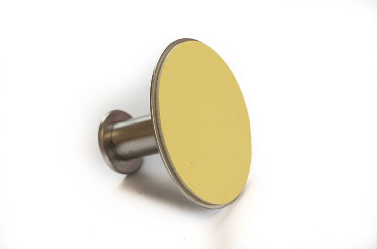 Türstopper aus Edelstahl mit runder Pufferfläche zur Bodenmontage oder Wandmontage.