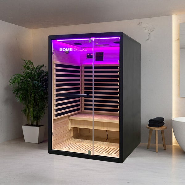 Home Deluxe Infrarotkabine mit Glasfront und LED Beleuchtung in einem modernen Badezimmer.