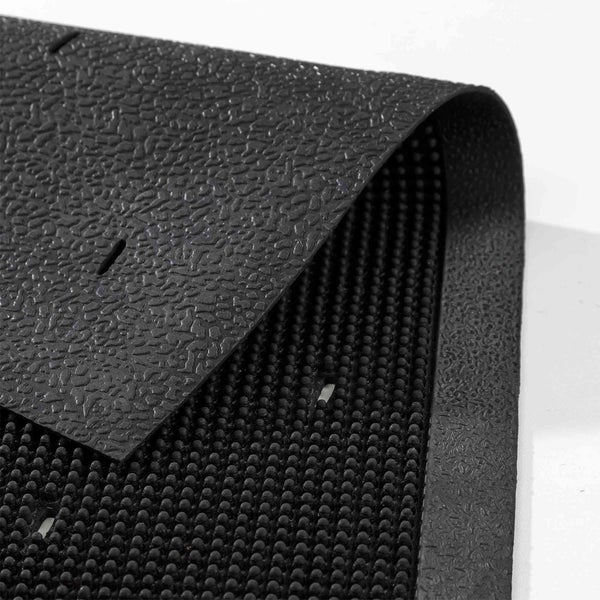 Schwarze Gummimatte mit Noppenstruktur