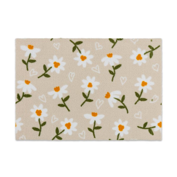 Rechteckige Textilmatte mit Gänseblümchen- und Herzmuster.