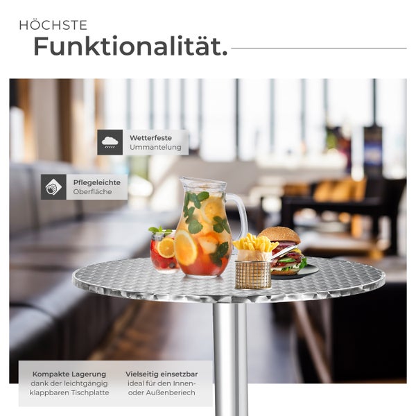 Runder Bistrotisch mit Getränken und Speisen dekoriert