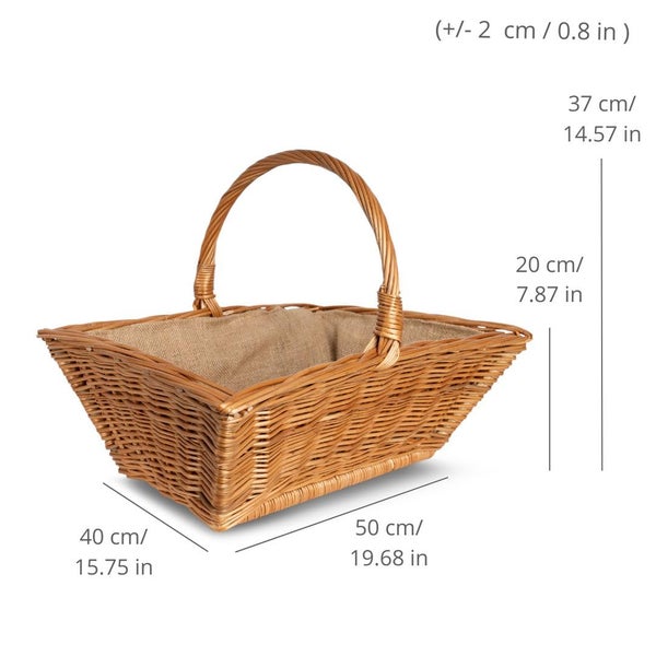 Ein mit einem dicken Naturseil aus Jute gebundenes Geschenk aus Jutestoff, neben einer dekorativen Zimmerpflanze in einem Topf.