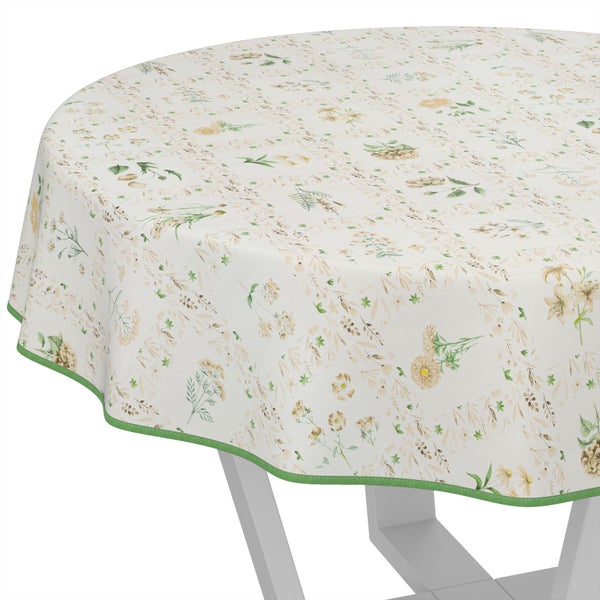 Runde Tischdecke mit Blumenmuster und grüner Bordüre auf Tisch