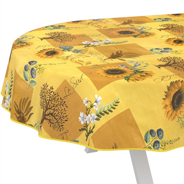 Runde gelbe Tischdecke mit Motiven von Sonnenblumen, Bäumen, Blumen, Karomuster und Schriftzug.