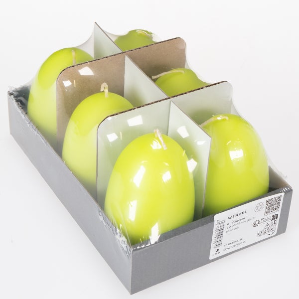 Sechs grüne Eierkerzen in einer Verpackung