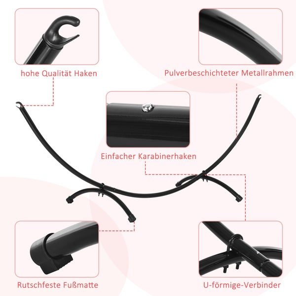 Ein Mann hält eine Trage mit Ziergräsern in einem Gewächshaus.