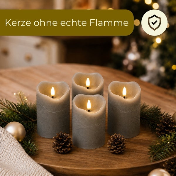 Drei zylindrische LED Stumpenkerzen mit flackerndem Lichteffekt auf einem Holztablett mit Tannenzweigen und Zapfen dekoriert.