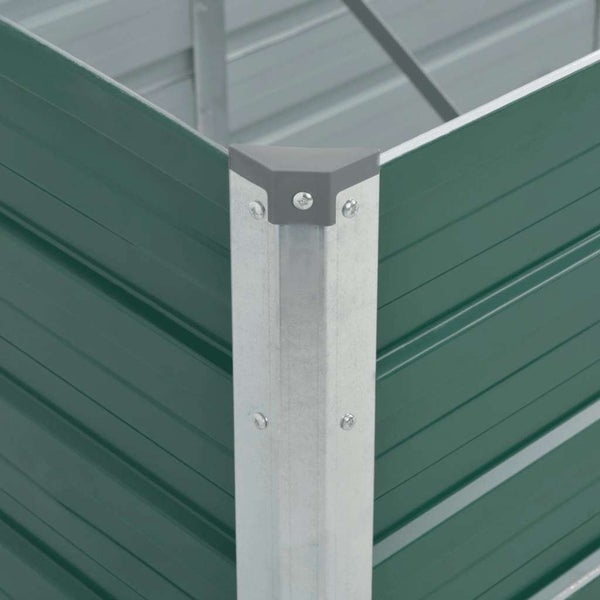 Detailansicht der Eckverbindung eines Hochbeets aus Metall mit gewellten Paneelen und Kunststoffschutzkappe.