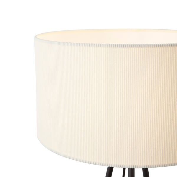 Nahaufnahme eines zylindrischen, cremefarbenen Lampenschirms mit gerippter Cord-Struktur für Stehlampen oder Tischlampen.