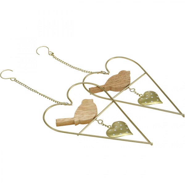 Zwei dekorative Herzanhänger mit Vogel- und Herzmotiven