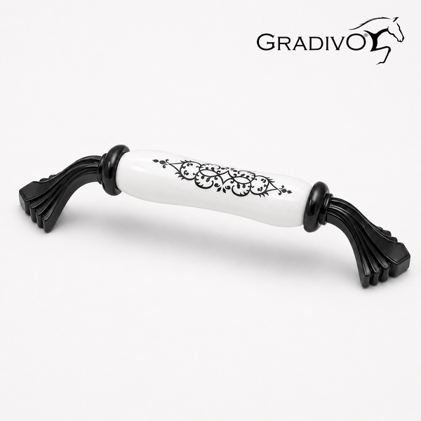 Möbelgriff aus Keramik und Metall mit schwarzem Ornament-Muster und verzierten Standfüßen. Gradivo Logo.