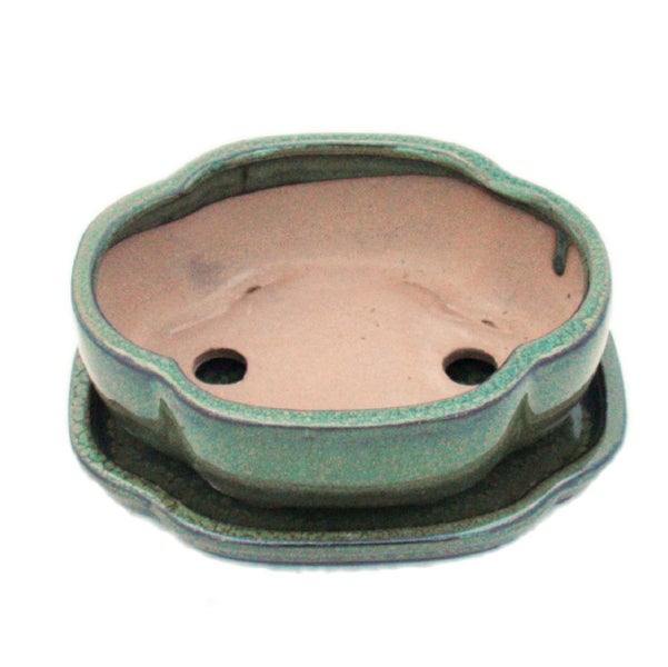 Glasierte Keramik-Bonsaischale mit passendem Untersetzer, geschwungene Form und zwei Entwässerungslöchern.