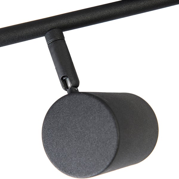 Schwarze Spotleuchte an einer Schiene