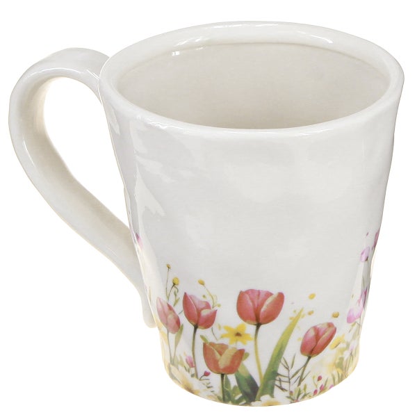 Weißes Keramik-Pflanzgefäß in Form einer Tasse mit Henkel und buntem Tulpen-Motiv am Boden.