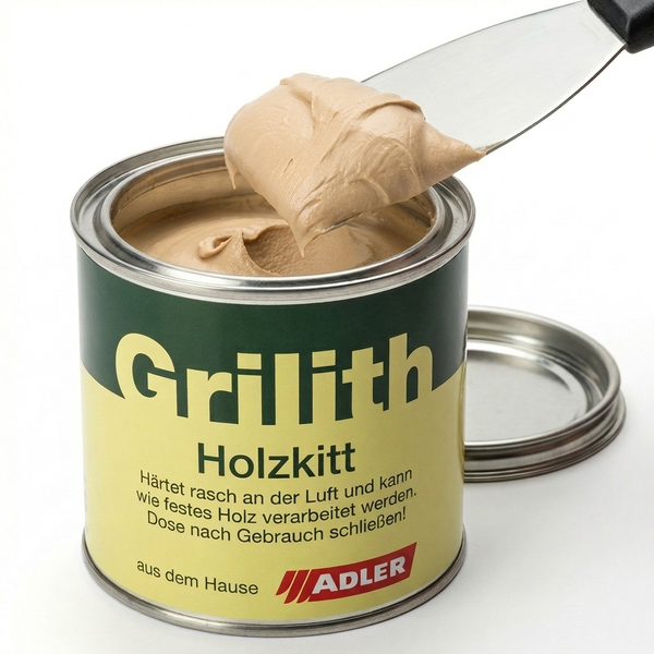 Adler Grilith Holzkitt in der Dose mit einem Spachtel, der eine kleine Menge entnimmt.