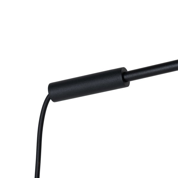 Detailansicht eines schwarzen Metallgriffs mit Schaumstoffpolsterung.