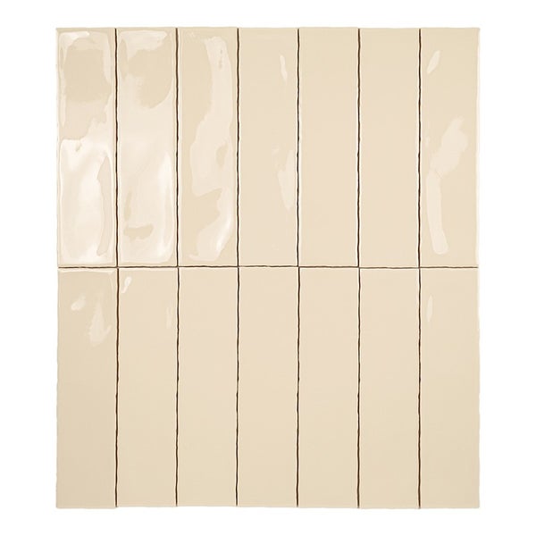 Beige Wandfliesen in Ziegeloptik mit glänzender Oberfläche angeordnet im Raster