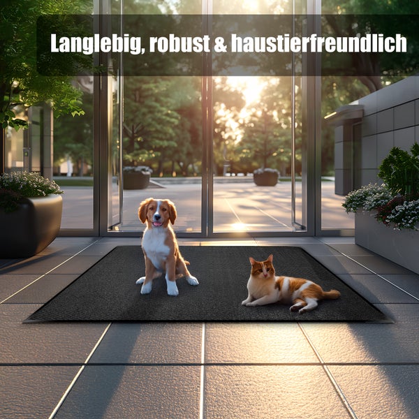 Schmutzfangmatte vor einer Tür mit Hund und Katze