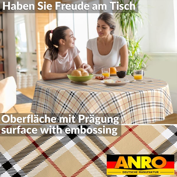 Rundes Wachstuch mit Karomuster, abwischbare Tischdecke mit geprägter Oberfläche. ANRO Logo. Mutter und Tochter sitzen an einem gedeckten Tisch.