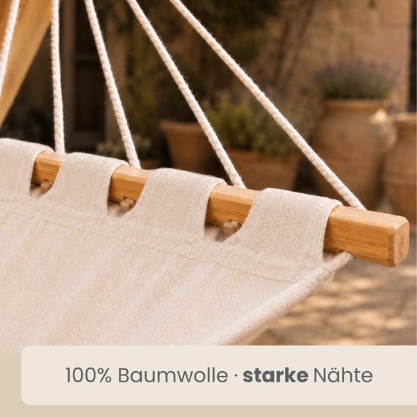 Detailansicht einer Hängematte aus 100 Prozent Baumwolle mit starken Nähten und einem Spreizstab aus Holz.