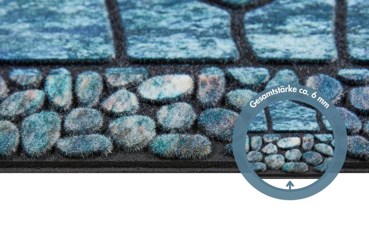 Fußmatte in Steinoptik mit einer Gesamtstärke von circa 6 Millimetern.