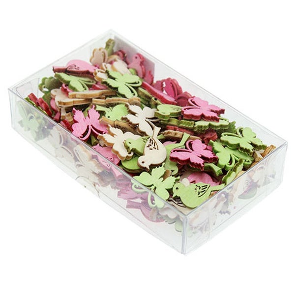 Dekoelemente aus Holz, Vogel und Blatt Motive in einer transparenten Box