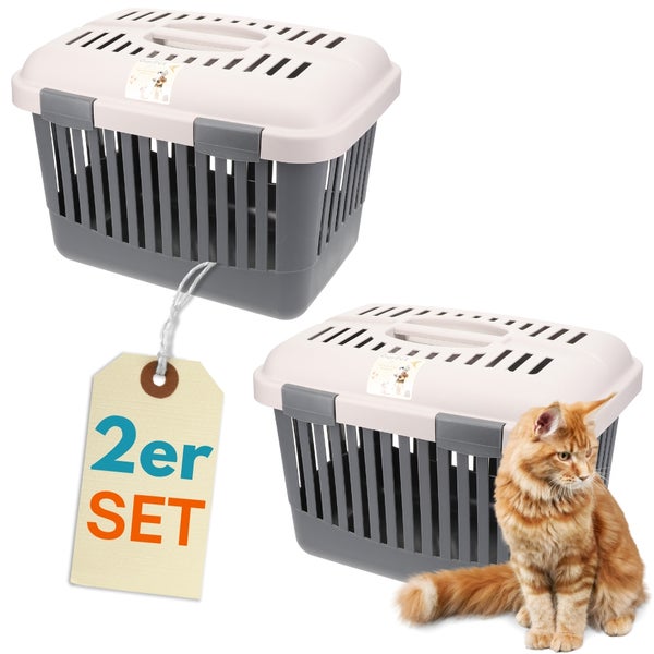 Zwei graue und weiße Tiertransportboxen mit einer roten Katze.