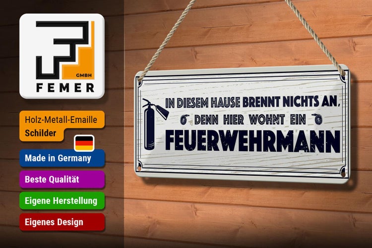 Schild mit der Aufschrift In diesem Haus brennt nichts an, denn hier wohnt ein Feuerwehrmann