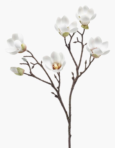 Künstlicher Magnolienzweig mit weißen Blüten und braunem Ast.