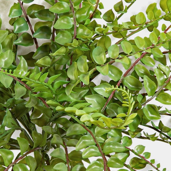 Künstliche Strelitzia mit grünem Stiel sowie orangefarbenen und violetten Blütenblättern.