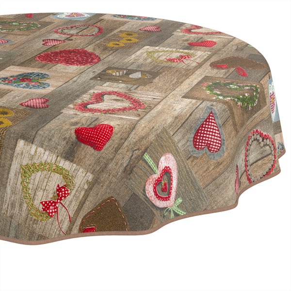 Runde Tischdecke mit rustikalem Holzdekor sowie Herz- und Kranzmotiven.