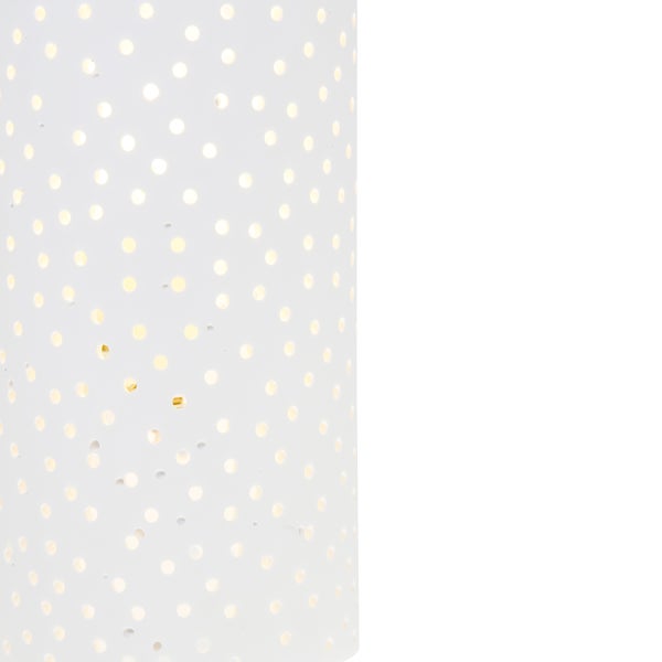 Dekorative Leuchte mit Punktmuster.