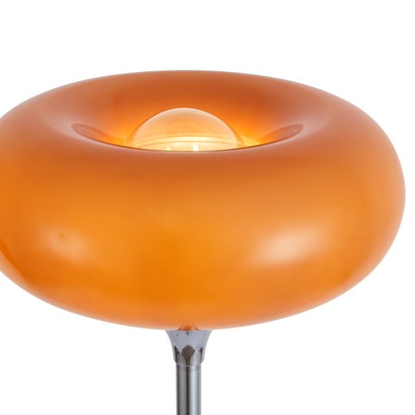 Moderne Stehleuchte mit ringförmigem Schirm aus Glas und Metallfuß für eine dekorative Raumbeleuchtung.