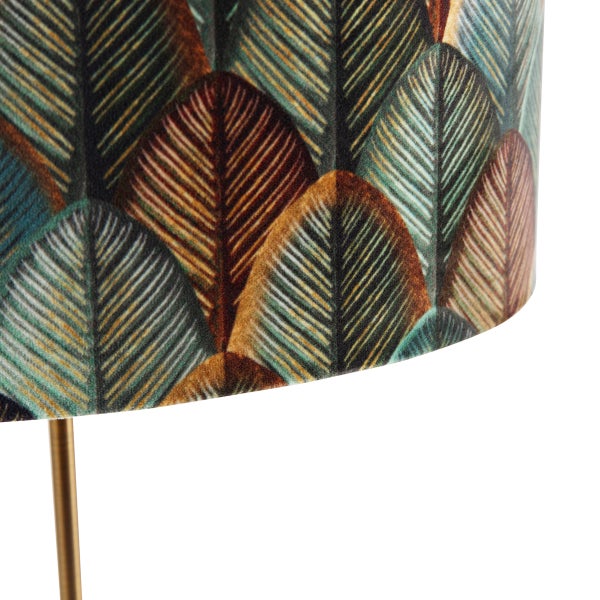 Nahaufnahme einer Stehlampe mit Blattmuster