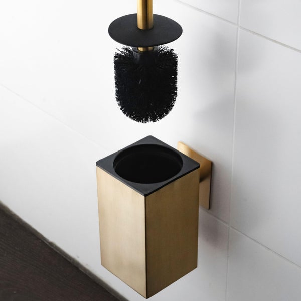 Wandmontierte WC-Bürstengarnitur in quadratischer Form mit Halterung und Bürste zur Befestigung an Fliesenwänden.