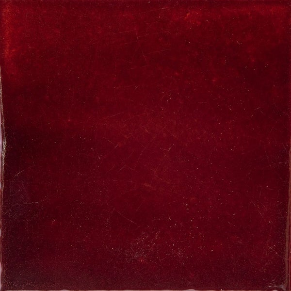 Einzelne rote Fliese