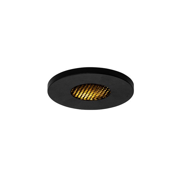 Runder schwarzer Einbaustrahler mit goldfarbenem Wabenreflektor.