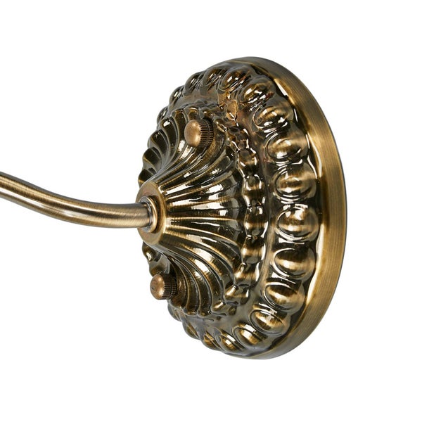 Wandleuchte aus Metall mit Reliefverzierungen