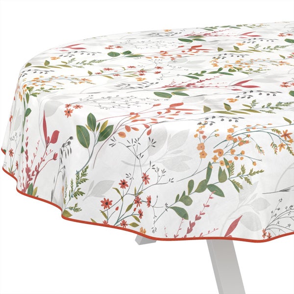 Runde Tischdecke mit floralem Muster aus Blättern und Blumen sowie rotem Rand.