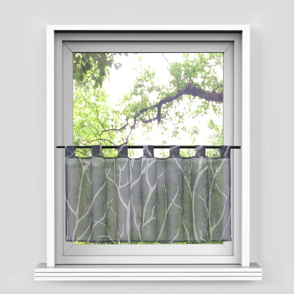 Gardinenstore mit Baumdesign vor einem Fenster