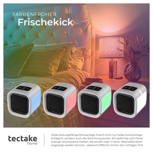 Vier tragbare Tectake Luftkühler mit farbigem LED-Panel im Schlafzimmer neben einem Bett.