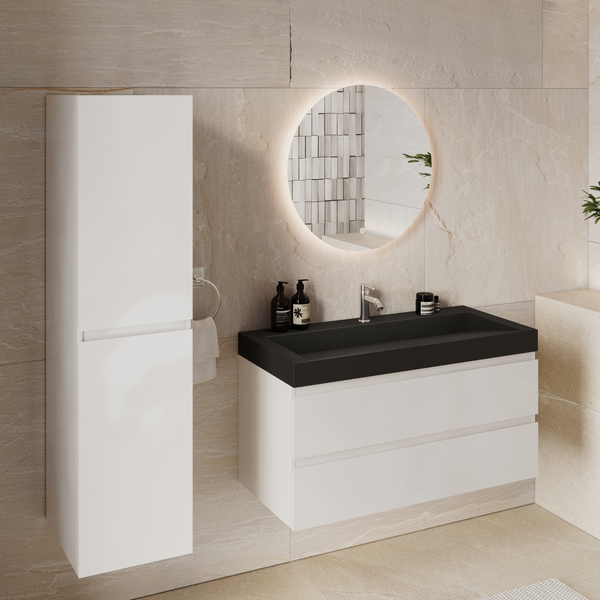 Moderner Waschtisch mit weißem Unterschrank mit zwei Schubladen und dunklem Aufsatzwaschbecken vor einer hellen Steinwand im Badezimmer.