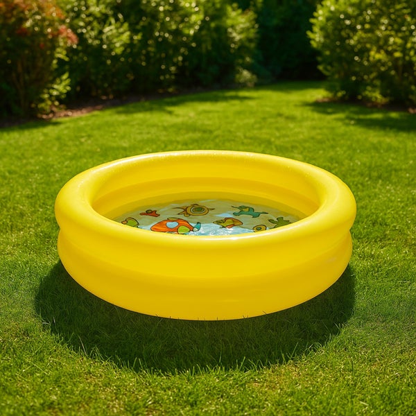Rundes aufblasbares Kinderplanschbecken für den Garten mit Tiermotiven am Boden.